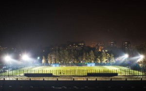 View of a soccer field lit with LED lighting