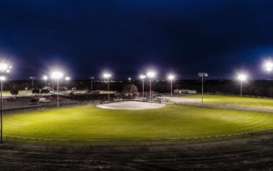 Baseball field lit up at night