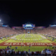 Panoramic view of the Florida State University football field lit up by bright lights at night